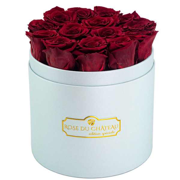 Rote Ewige Rosen in azurblauer Rosenbox